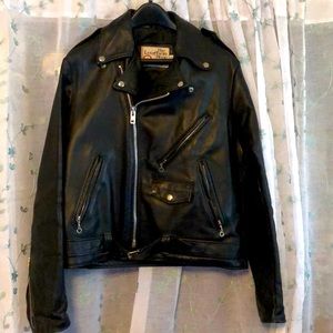 Vintage men’s black leather motorcycle jacket.